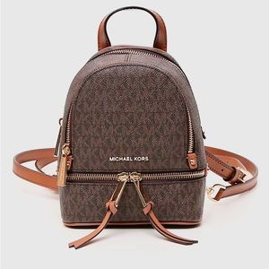 Michael Kor’s Rhea mini backpack in EUC.